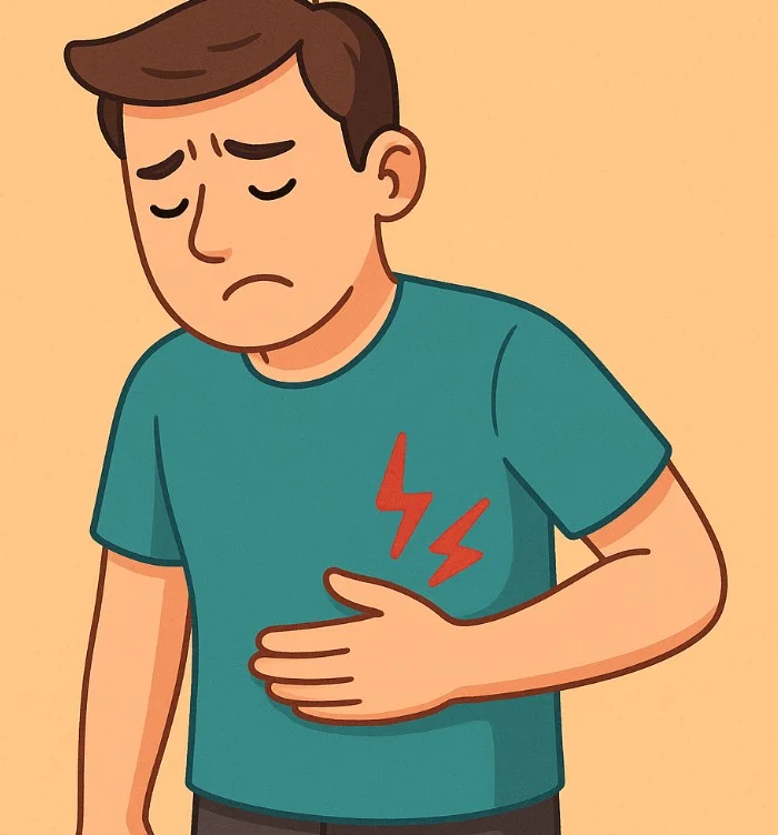 Cartoon man holding upper right abdomen in pain, indicating possible liver discomfort from NAFLD